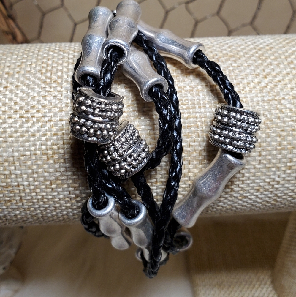 Silver tone and faux braded leather bracelet
